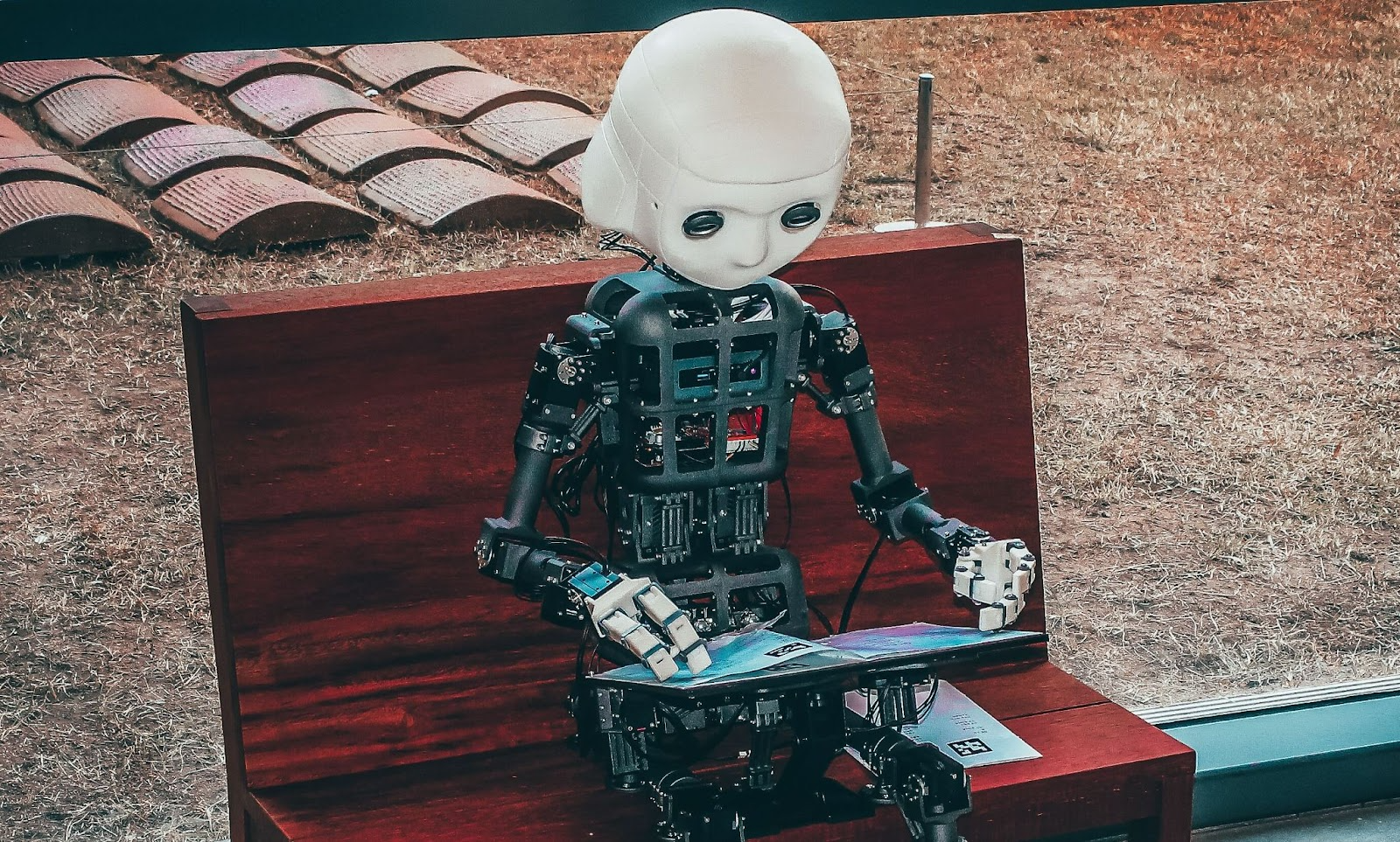 a humanoid trying to read and comprehend